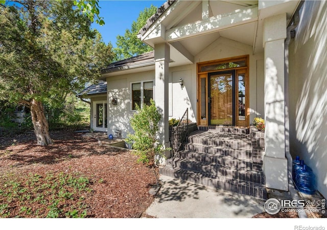 7309 Didrickson Ct, Fort Collins, CO 80528 - property entrance featuring stucco siding