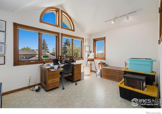 7309 Didrickson Ct, Fort Collins, CO 80528 - office space featuring rail lighting, tile patterned floors, baseboards, and high vaulted ceiling