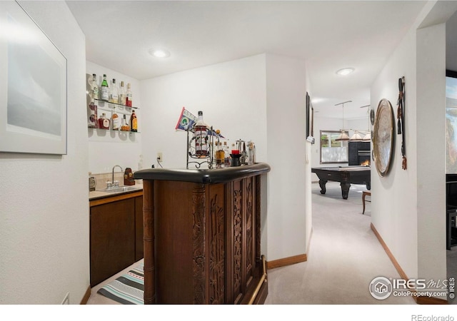 7309 Didrickson Ct, Fort Collins, CO 80528 - indoor wet bar with billiards table, light colored carpet, recessed lighting, and baseboards
