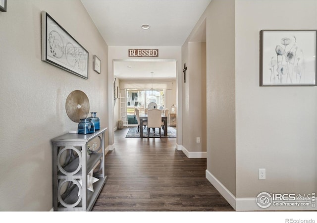 25190 E Nova Pl, Aurora, CO 80016 - hall with wood finished floors and baseboards