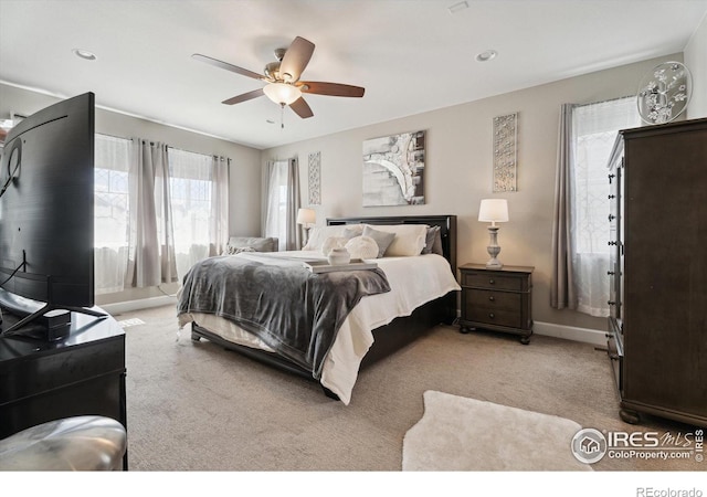 25190 E Nova Pl, Aurora, CO 80016 - bedroom featuring light colored carpet, a ceiling fan, and baseboards