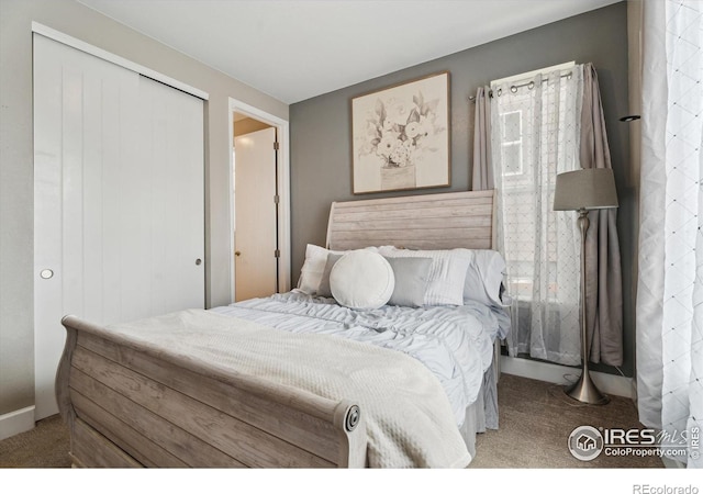 25190 E Nova Pl, Aurora, CO 80016 - carpeted bedroom featuring a closet and baseboards