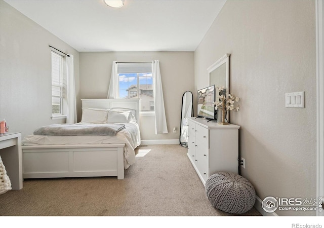 25190 E Nova Pl, Aurora, CO 80016 - bedroom featuring light carpet and baseboards
