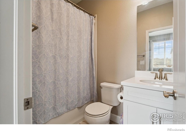 25190 E Nova Pl, Aurora, CO 80016 - full bath with toilet, vanity, and shower / bath combo with shower curtain
