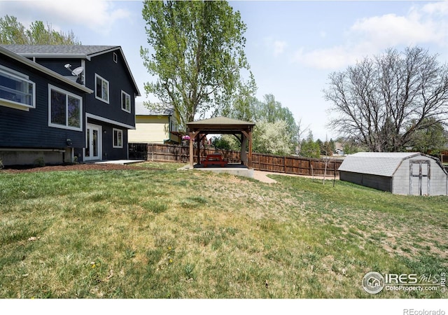 12506 Maria Cir, Broomfield, CO 80020 - view of yard featuring a gazebo, a patio, a storage shed, and an outdoor structure
