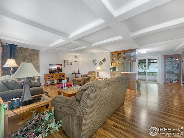 1145 S Bowman Ave, Holyoke, CO 80734 - living room featuring coffered ceiling, wood finished floors, and beam ceiling
