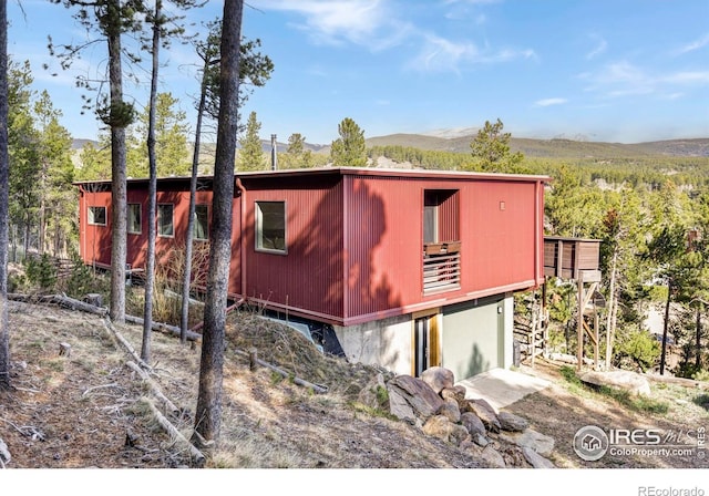 view of outdoor structure featuring a mountain view