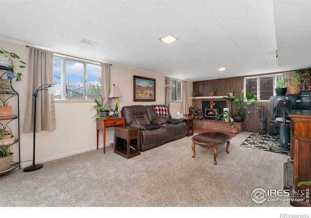 living area with carpet floors and baseboards