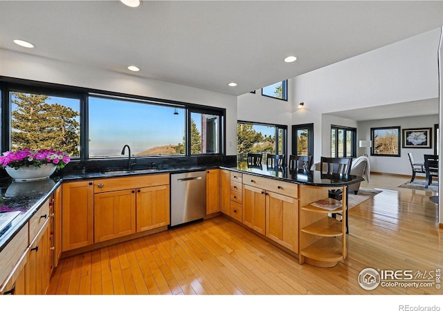 kitchen featuring dishwasher, a sink, open shelves, light wood-style flooring, and recessed lighting