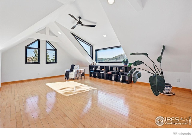 additional living space featuring hardwood / wood-style floors, a ceiling fan, baseboards, and recessed lighting