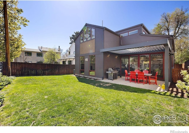 back of house featuring a patio area