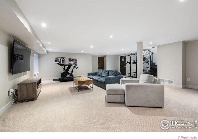 living room featuring carpet, recessed lighting, stairway, and baseboards