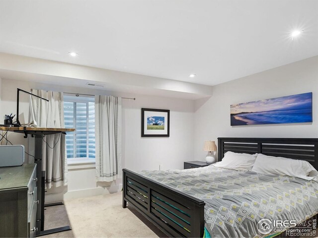 711 Hawthorn Ave, Boulder, CO 80304 - bedroom with light colored carpet, recessed lighting, and baseboards