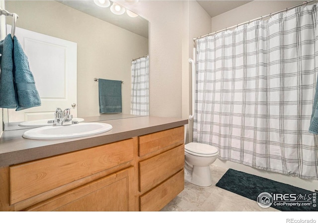 full bathroom with toilet, vanity, and shower / bath combo with shower curtain