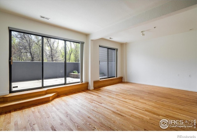 836 Walnut St Unit B, Boulder, CO 80302 - empty room with light wood finished floors and baseboards