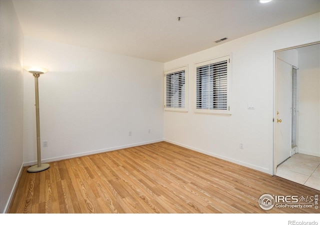 836 Walnut St Unit B, Boulder, CO 80302 - unfurnished room with light wood-type flooring and baseboards