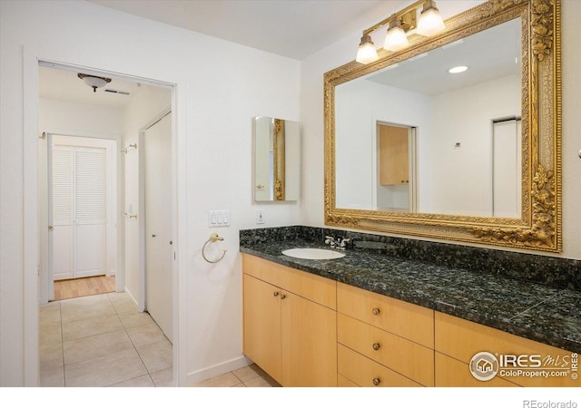 836 Walnut St Unit B, Boulder, CO 80302 - bathroom featuring tile patterned flooring and vanity