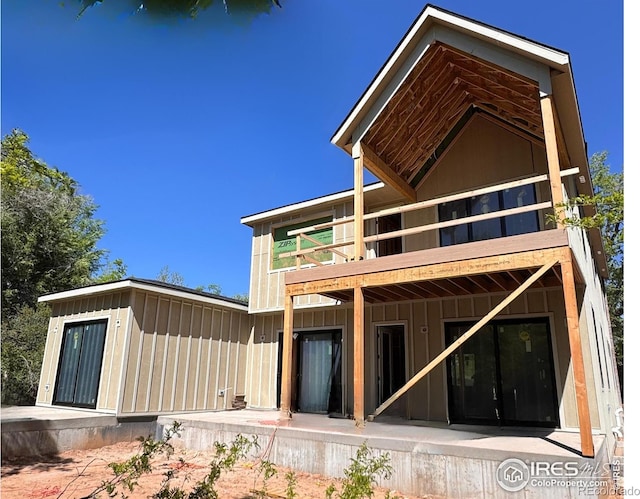 2941 21st St, Boulder, CO 80304 - back of house featuring board and batten siding and a balcony