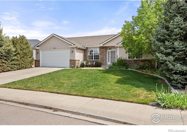 316 Whitney Bay, Windsor, CO 80550 - ranch-style house with brick siding, an attached garage, a front yard, and driveway