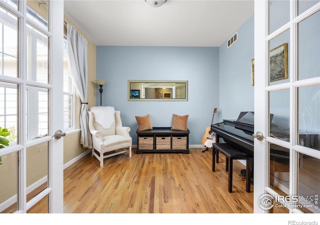 316 Whitney Bay, Windsor, CO 80550 - living area with light wood-style floors and baseboards