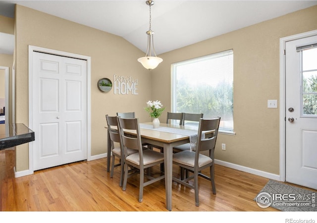 316 Whitney Bay, Windsor, CO 80550 - dining space featuring light wood-type flooring, baseboards, and lofted ceiling