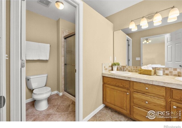 316 Whitney Bay, Windsor, CO 80550 - full bath with toilet, a stall shower, and tile patterned floors