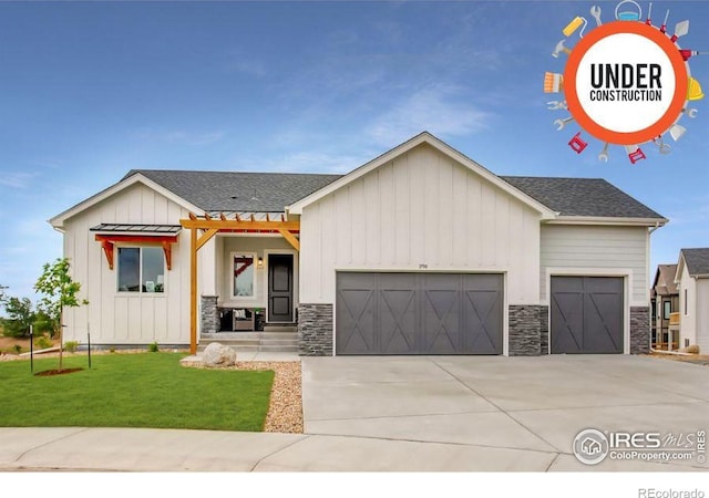 20 Snowcap Dr, Windsor, CO 80550 - modern farmhouse with stone siding, an attached garage, board and batten siding, and concrete driveway