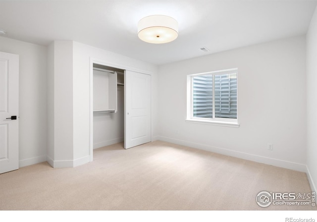 20 Snowcap Dr, Windsor, CO 80550 - unfurnished bedroom with carpet flooring, a closet, and baseboards