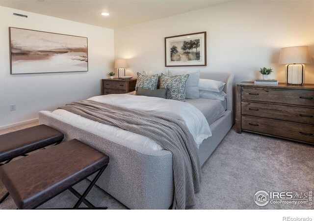 bedroom with carpet flooring and recessed lighting