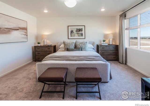 bedroom featuring carpet floors, baseboards, and recessed lighting