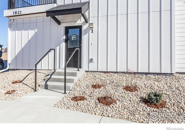 property entrance with board and batten siding