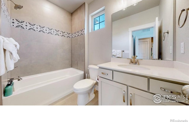 4157 Trapper Lake Dr, Loveland, CO 80538 - bathroom with toilet, vanity, and bathtub / shower combination