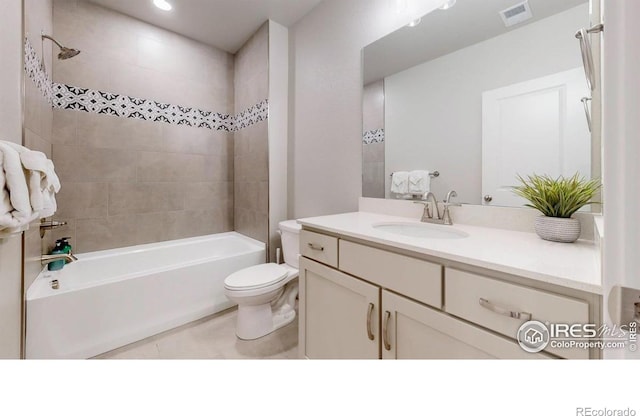 4157 Trapper Lake Dr, Loveland, CO 80538 - bathroom featuring toilet, vanity,  shower combination, and tile patterned flooring
