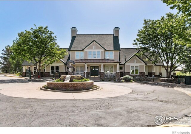 view of front of home featuring brick siding