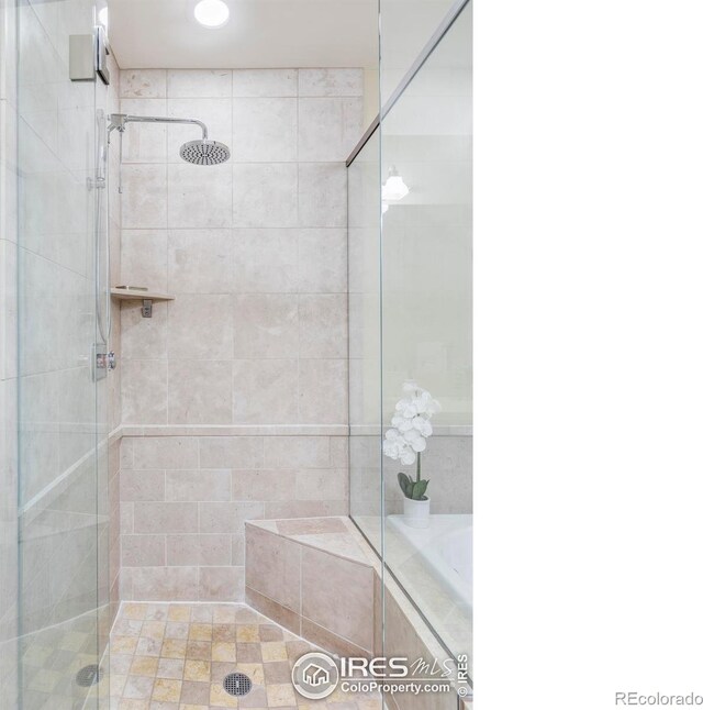 bathroom with a stall shower