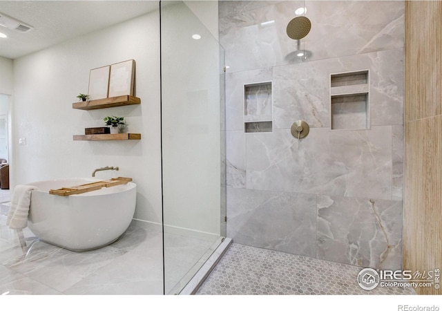 5304 Vardon Way, Fort Collins, CO 80528 - bathroom with walk in shower and a soaking tub