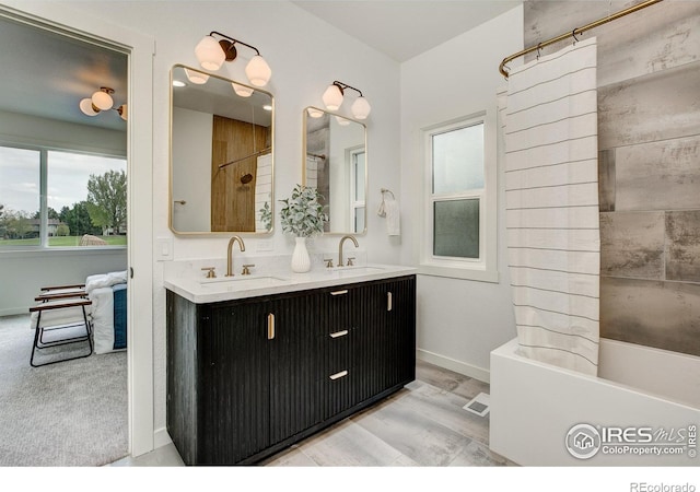 5304 Vardon Way, Fort Collins, CO 80528 - bathroom featuring double vanity and shower / tub combo