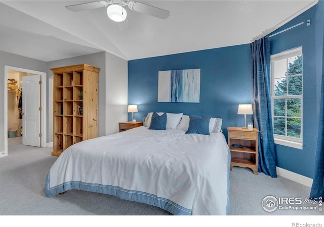 1369 Padfield Pl, Erie, CO 80516 - carpeted bedroom with baseboards, lofted ceiling, and ceiling fan