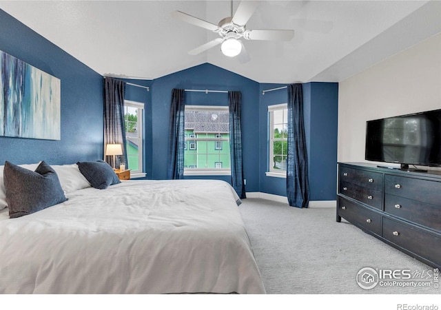 1369 Padfield Pl, Erie, CO 80516 - bedroom with carpet floors, lofted ceiling, baseboards, multiple windows, and ceiling fan