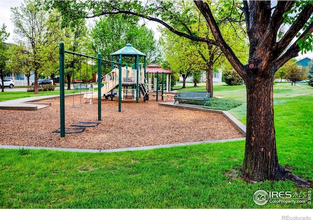 1369 Padfield Pl, Erie, CO 80516 - community jungle gym featuring a lawn