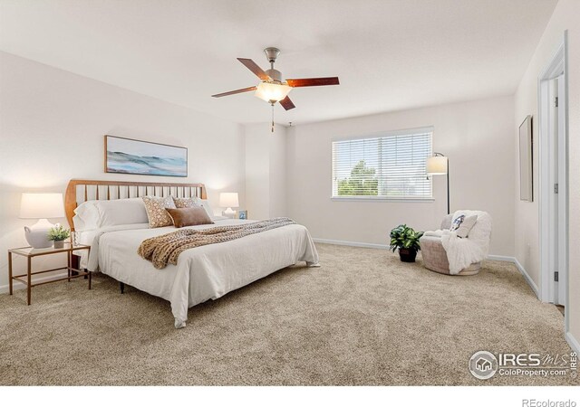 687 Jarvis Dr, Erie, CO 80516 - carpeted bedroom featuring baseboards and ceiling fan