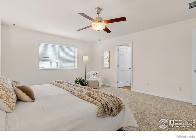 687 Jarvis Dr, Erie, CO 80516 - carpeted bedroom featuring baseboards and ceiling fan
