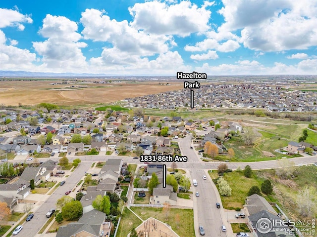 view of property location with nearby suburban area