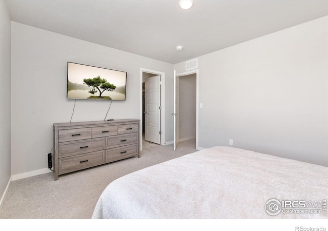 602 Santa Fe Trl Unit D1, Ault, CO 80610 - bedroom featuring light colored carpet and baseboards