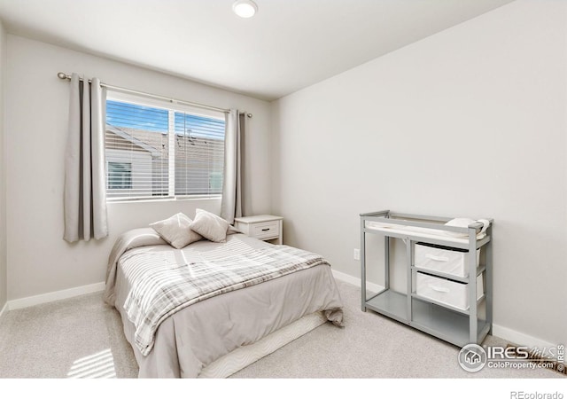 602 Santa Fe Trl Unit D1, Ault, CO 80610 - bedroom featuring carpet flooring and baseboards