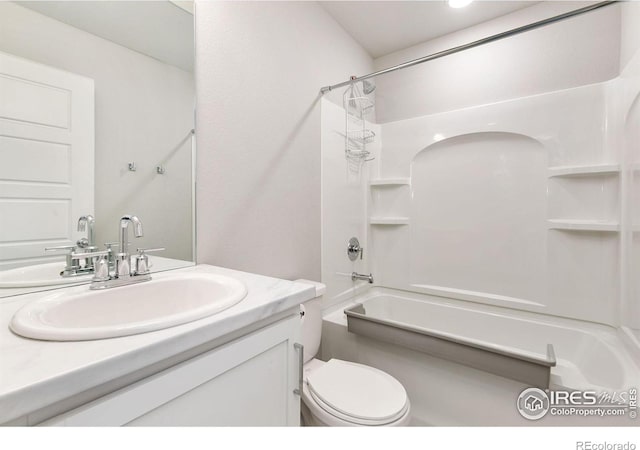 602 Santa Fe Trl Unit D1, Ault, CO 80610 - bathroom featuring vanity, bathtub / shower combination, and toilet