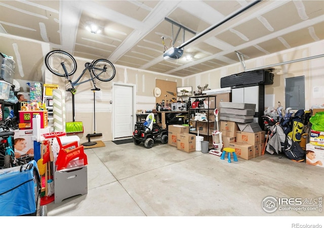 602 Santa Fe Trl Unit D1, Ault, CO 80610 - garage with electric panel and a garage door opener