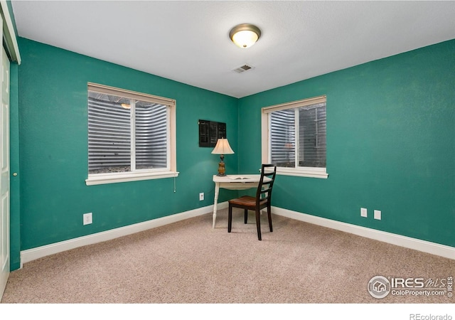 office area featuring carpet floors and baseboards