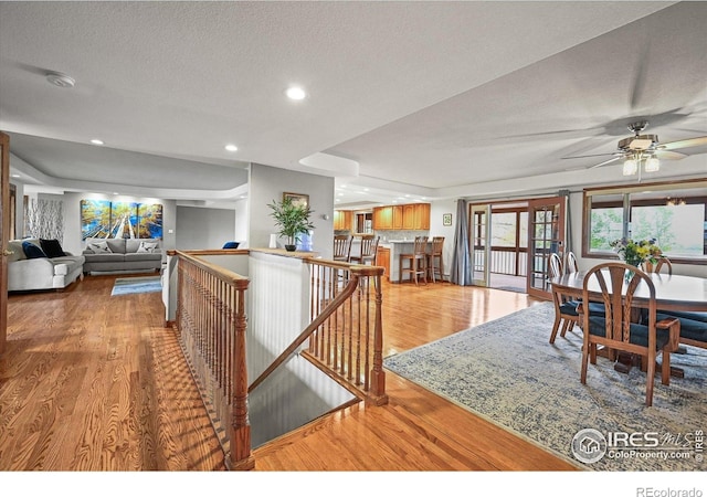 14531 Country Hills Dr, Brighton, CO 80601 - kitchen featuring wood finished floors, a textured ceiling, ceiling fan, and recessed lighting