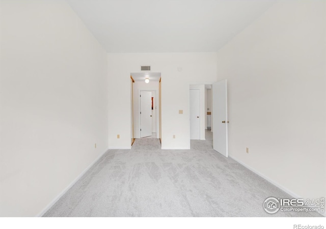 3260 47th St Unit 207A, Boulder, CO 80301 - empty room featuring light carpet and baseboards